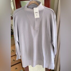 Half zipper pull on sweater